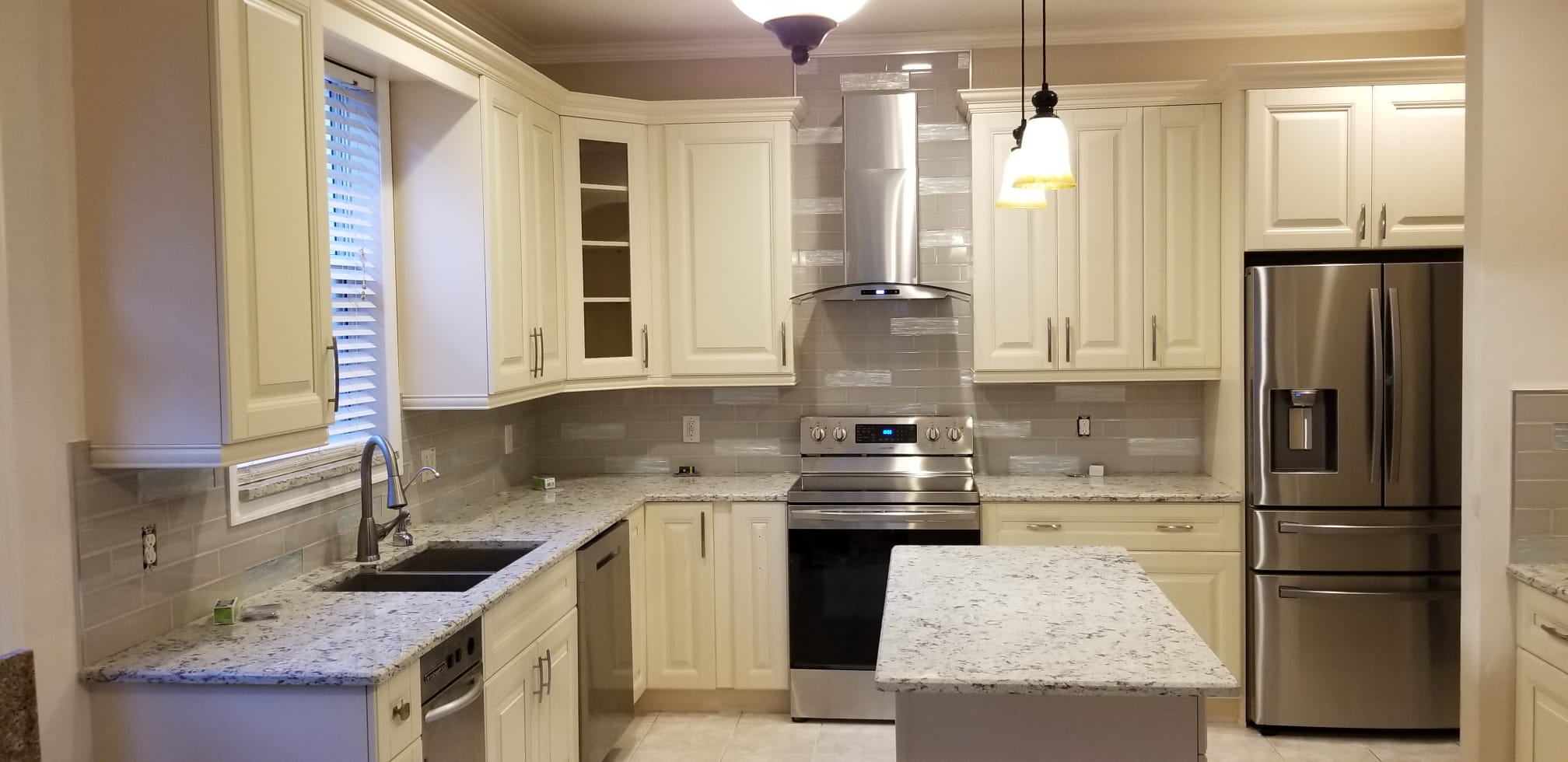 Beautiful, brightly lit, clean kitchen with new appliances
